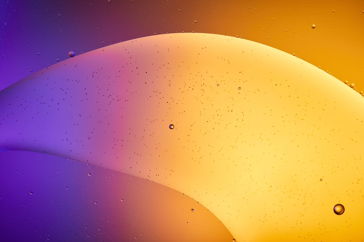 Beautiful abstract orange and purple color background from mixed water and oil